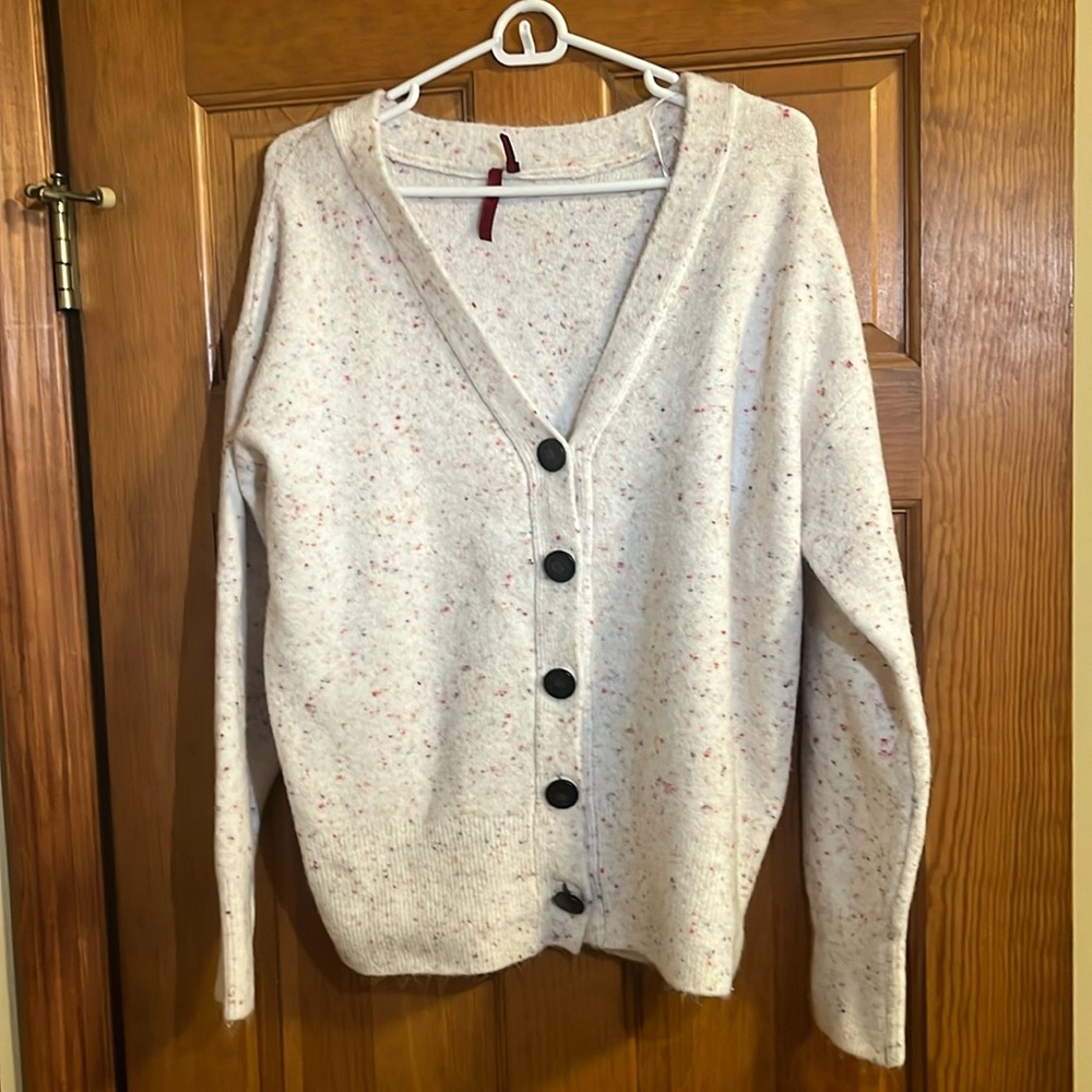 Pretty casual fall/winter sweater. Multi color. 26 inches in length.